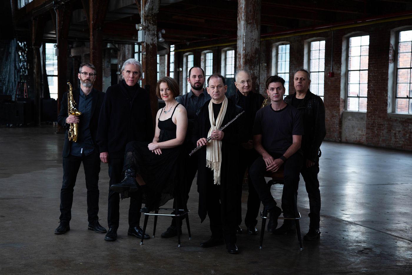 Philip Glass Ensemble, partituras marca Glass (Reisman, el segundo por la izquierda).